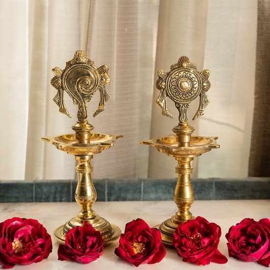 Picture of Brass Shankh Chakra Standing diyas pair (2000 gr approx)(20*8  cm  approx)